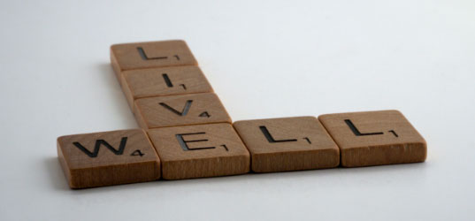 Live well spelt with scrabble tiles