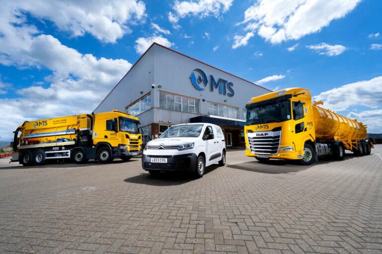 Outside MTS warehouse with a van, truck and lorry